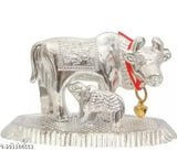 Handmade metal silver Kamdhenu cow and calf spiritual showpiece, Indian artisan-crafted animal figurine for pooja, home decor, office, or car dashboards