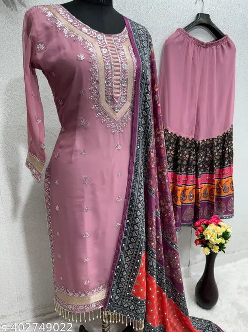 New designer heavy faux georgette sequined work pakistani suit with black embellishments, intricate embroidery, long sleeves, side slit