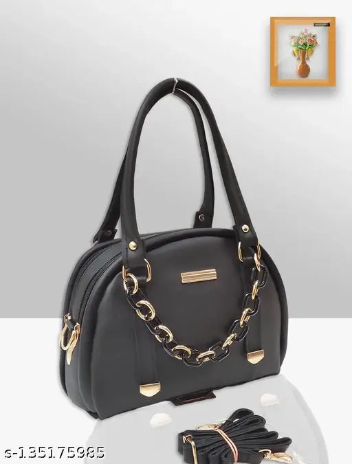 Black leather crossbody bag with silver zippers, multiple card slots