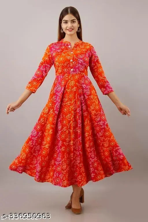 Women's rayon flared printed orange kurti with three-quarter sleeves, size S to XXL. Rayon material from India