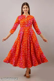 Women's rayon flared printed orange kurti with three-quarter sleeves, size S to XXL. Rayon material from India