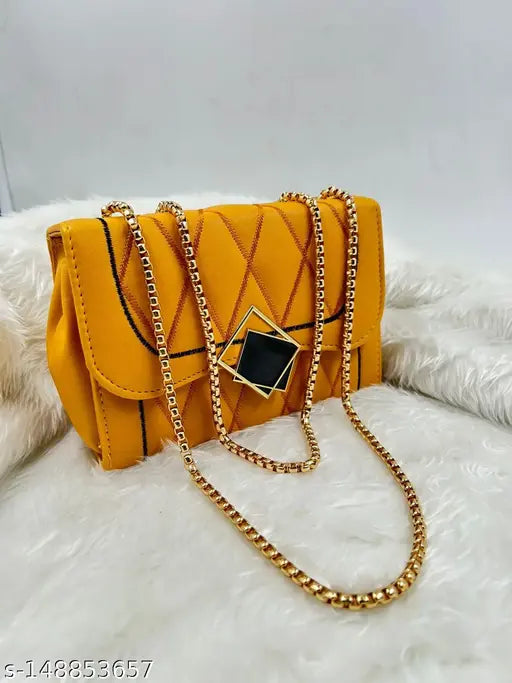 A designer sling bag featuring a multiple compartment design, showcasing a yellow exterior and black accents