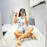 Cartoon print silk blend ladies night suit, luxury sleepwear set with shirt, pajama, and shorts. Soft material for comfort and shine. Made in India