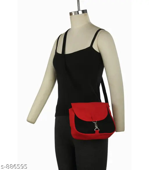 Black faux leather sling bag, red strap