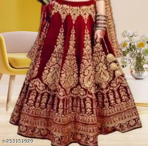 Velvet red lehenga choli with net dupatta, elegant semi-stitched embroidered design, perfect for festivals or parties. Made in India
