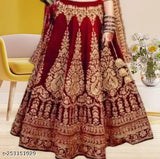 Velvet red lehenga choli with net dupatta, elegant semi-stitched embroidered design, perfect for festivals or parties. Made in India
