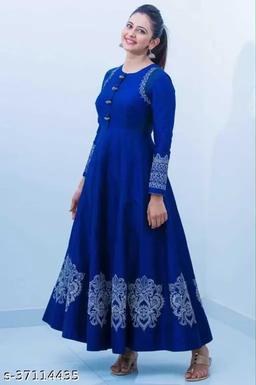 Royal blue kurta, long sleeve, embroidered design, worn by a woman with black hair, posing against a white background