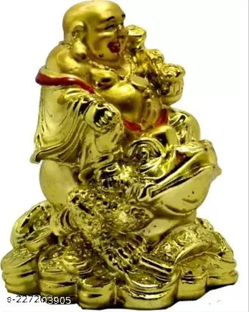 Gold-plated laughing Buddha on frog, handcrafted polyresin showpiece. Spiritual Vastu decor for home or office." (108 characters)