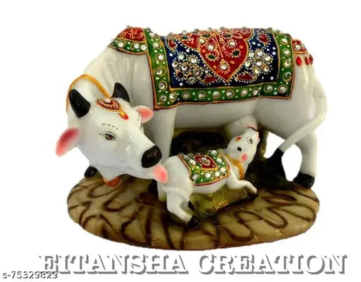 Hand-crafted resin Kamdhenu cow and calf statue, traditional spiritual decor for home or office, Indian origin