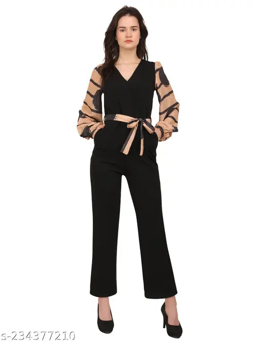 Stylish Lycra jumpsuit with printed net, imported from India. Long sleeves, digital print fabric used in sleeves and matching belt included. Size S: 36in bust, 52in length, 30in waist