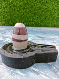 Brown marble Narmadeshwar Shivling, sacred symbol for home pooja, handcrafted from Narmada River stone