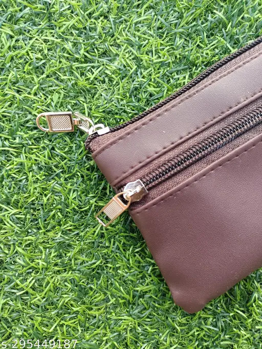 Leather zipper wallet, solid color, compact design for women, men, girls, boys. Made in India." (124 characters)