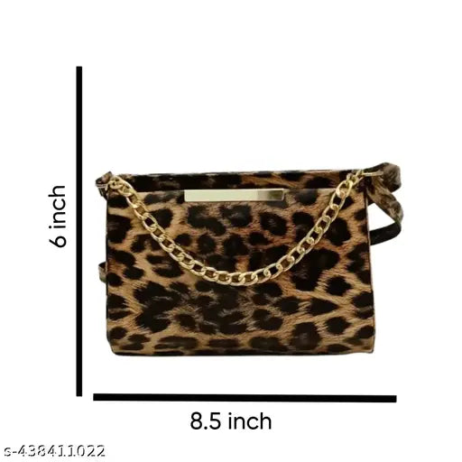 Sling purse with cheetah print, chain closure, 6 inches long