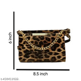 Sling purse with cheetah print, chain closure, 6 inches long