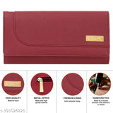 Stylish women's pink faux leather clutch wallet with a visible metallic zip closure