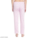 Pink pajamas with white polka dots