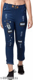 Light blue women's jeans with frayed hems and embroidered stars