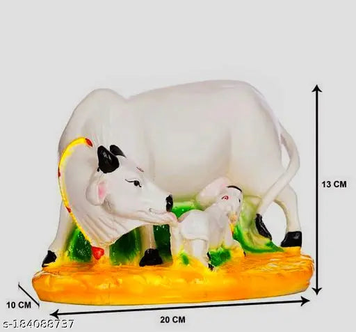 Cow and calf figurine, white ceramic sculpture with gold accents