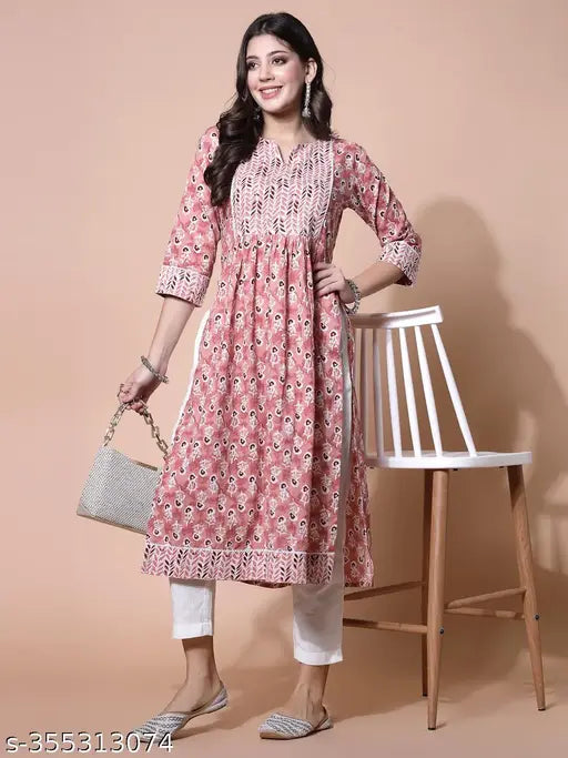 Peach cotton printed Nayra cut straight kurta with three-quarter sleeves and contrast white lace detail, India origin