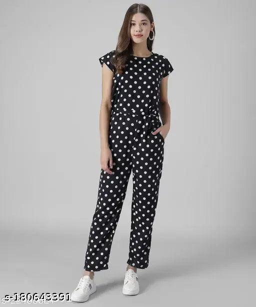Black dotted jumpsuit, printed crepe material, short sleeves, women's fashion accessory on hanger