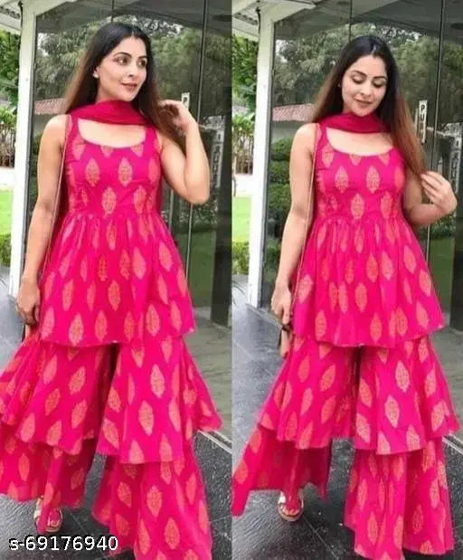 Pink and gold printed kameez with flared sleeves and a full skirt, styled with a long dupatta