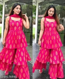 Pink and gold printed kameez with flared sleeves and a full skirt, styled with a long dupatta