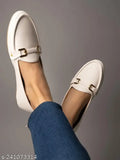 Synthetic, slip-on white bellies with golden metal buckle for women & girls - stylish casual footwear on a soft surface, ready to offer comfort and confidence