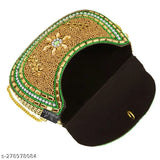 A handcrafted gold embellished clutch purse with a sling bag design, showcasing a detailed embroidery pattern