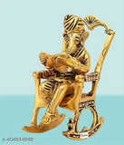 Metal Ganesh reading Ramayana statue, Hindu God Ganesha sitting on swinging chair idol, 6cm x 14cm x 8cm Indian handcrafted decorative showpiece