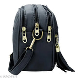 Black sling bag with multiple compartments, adjustable strap and shoulder pad
