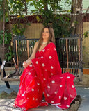 Red traditional saree with heart design, sleeveless blouse