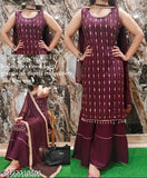 Maroon shalwar kameez set with dupatta and matching accessories