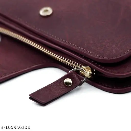 Red long women's purse, features a zip closure and multiple pockets for cards and other items. Fashionable accessory with 16 slots