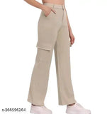 Cream pants with four pockets, mid-calf length