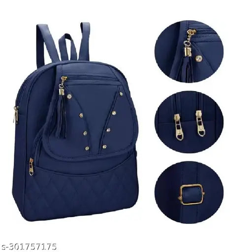 Small navy blue backpack with multiple compartments and zip closures, suitable for women or girls in fashion
