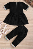 Elegant black embroidery cotton blend kurti set for kids, three-quarter sleeves, Indian traditional clothing on display