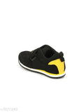 Black Tuskey boys sneakers with yellow and white accents