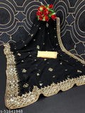 Gold heavy saree with embroidered floral work, velvet lace, and a presentative bow on top