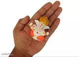 Orange poly resin Ganesh idol for car dashboard, popular Hindu deity figure on Indian dashboards