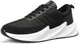 Kids black sports shoes with white trim for running, walking, and casual wear
