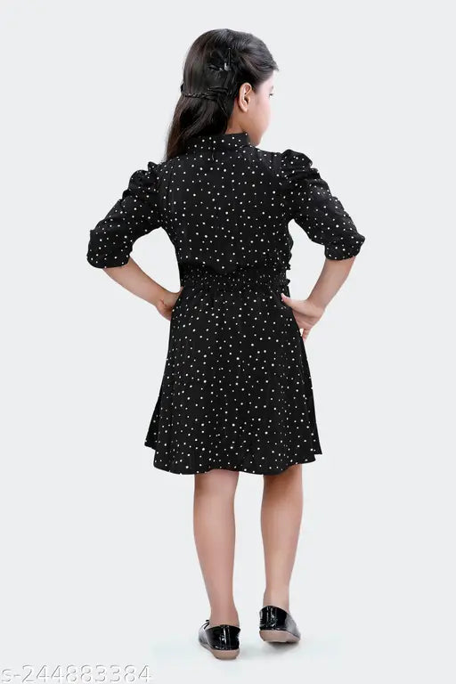 Black and white polka dot summer dress, short sleeves, fitted waist, knee length