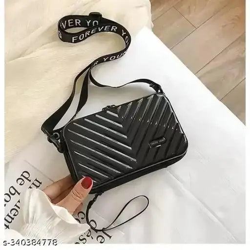 Crossbody sling purse, black with zip closure, suitable for women