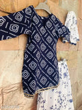 Bandhani printed cotton kurti-skirt set with dupatta for girls, vibrant colors, three-quarter sleeves, Indian origin
