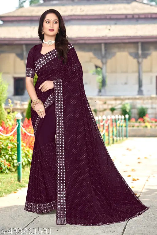 Maroon saree with detailed paisley design and border