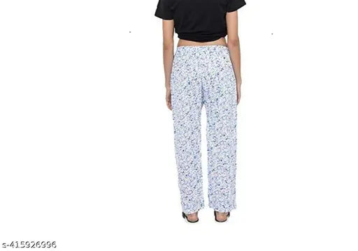 A pair of women's track pants with a lower cut, fully stretchable waistband. These pajamas feature an invata brand design and are made from soft cotton material