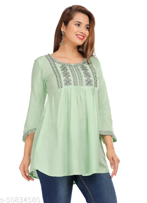 Green rayon three-quarter sleeve embroidered casual top, women's size S with 36" bust and 32" length, beautifully feminine on brunch occasion