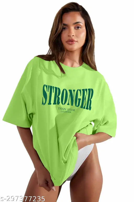 A woman wearing a green leotard with the word STRONGER in white letters on the front