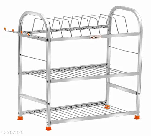 A stainless steel wall mount kitchen rack, designed with three shelves for efficient dish storage. This rack is suitable for kitchen essentials like plates, bowls and kitchen accessories. Made of high-quality stainless steel, it offers durability and easy cleaning. The wall mount design saves counter space and adds a sleek touch to the kitchen décor