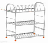 A stainless steel wall mount kitchen rack, designed with three shelves for efficient dish storage. This rack is suitable for kitchen essentials like plates, bowls and kitchen accessories. Made of high-quality stainless steel, it offers durability and easy cleaning. The wall mount design saves counter space and adds a sleek touch to the kitchen décor