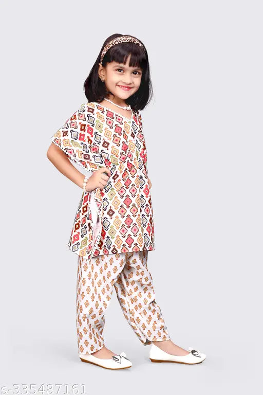 Cotton girl kaftan top and harem pants set, vibrant print design for kids. Quality Indian ethnic wear perfect for casual or special occasions